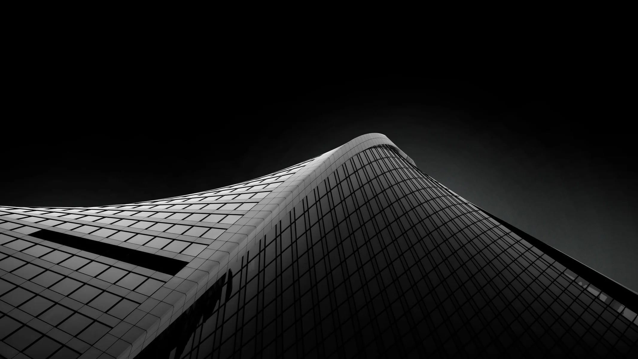 Curved black-and-white tower