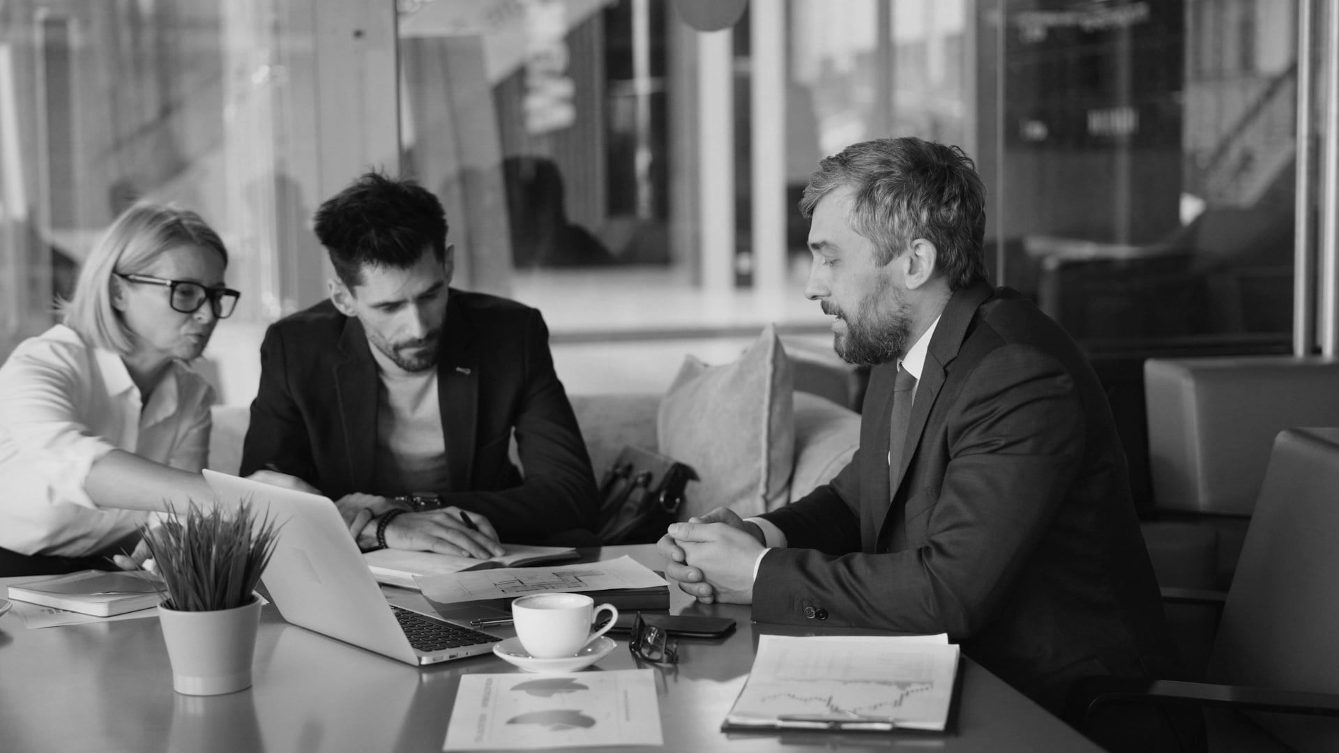Team discussion shaping real estate branding strategy