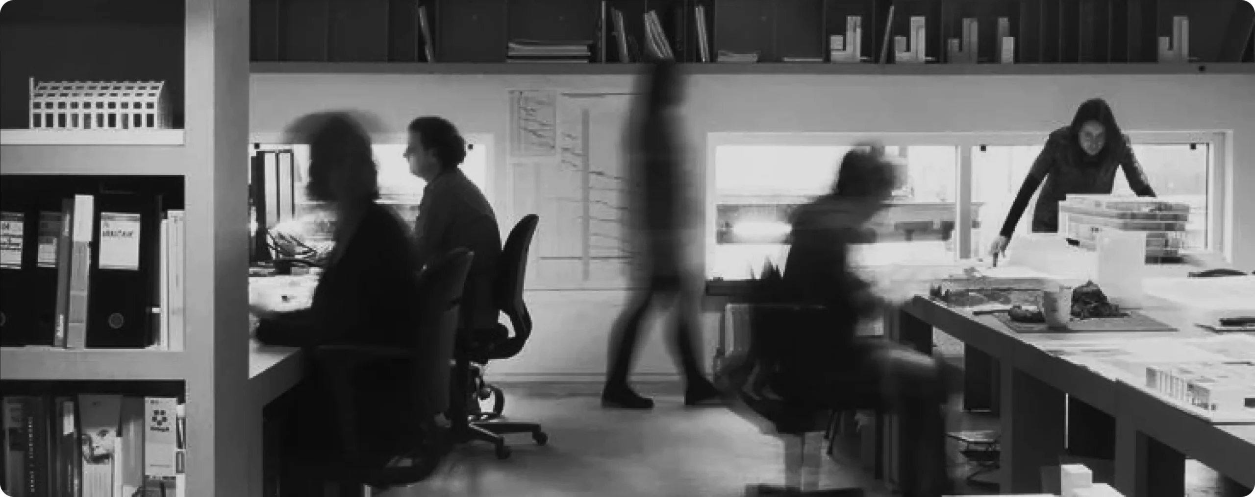 Architecture studio team at work, black and white