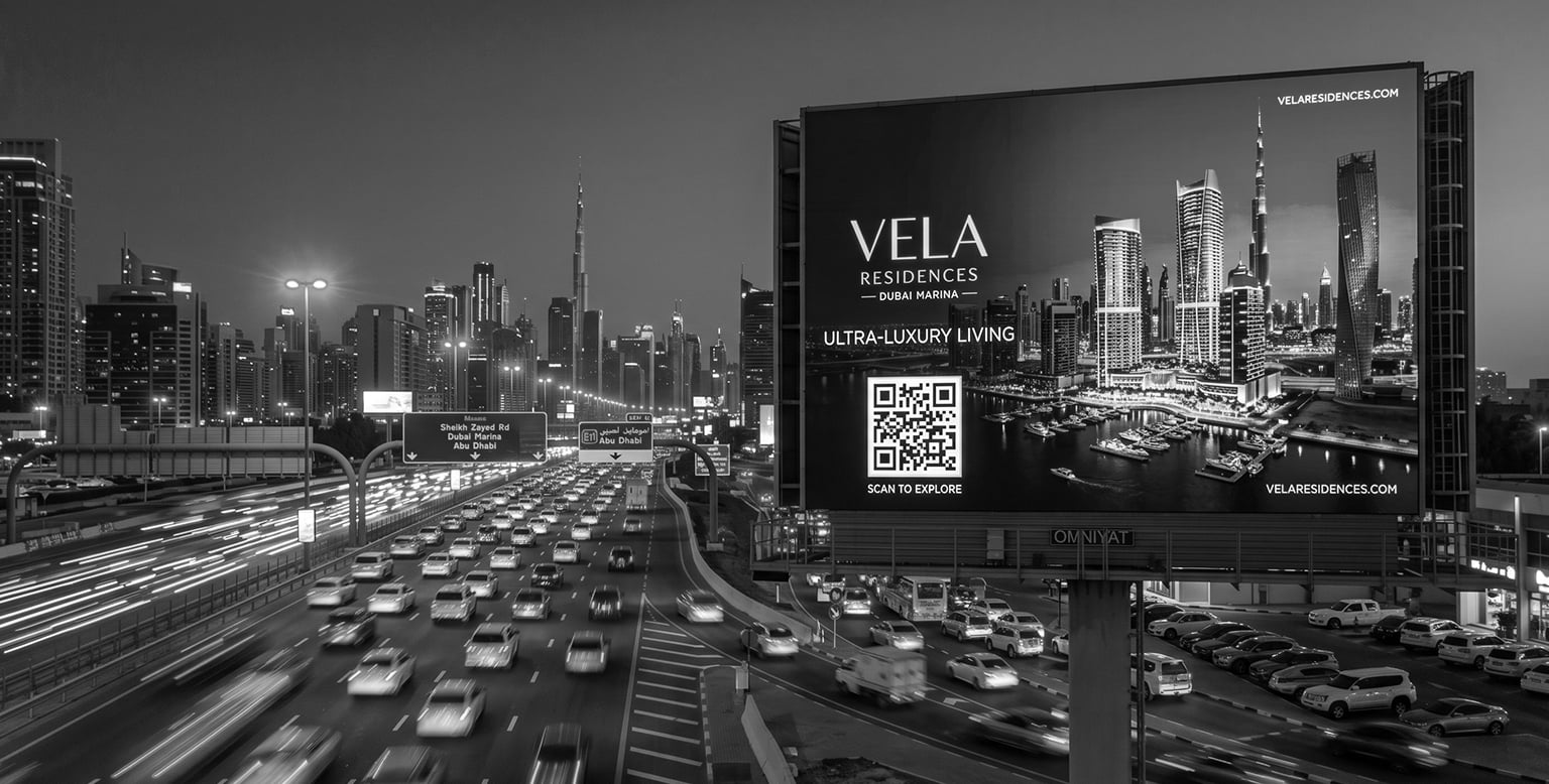 Dubai OOH billboard with trackable QR code linking to a project landing page