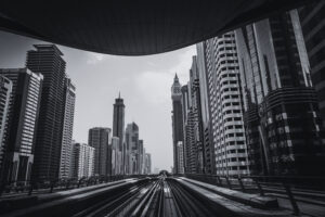 Empty city road surrounded by modern high-rise buildings