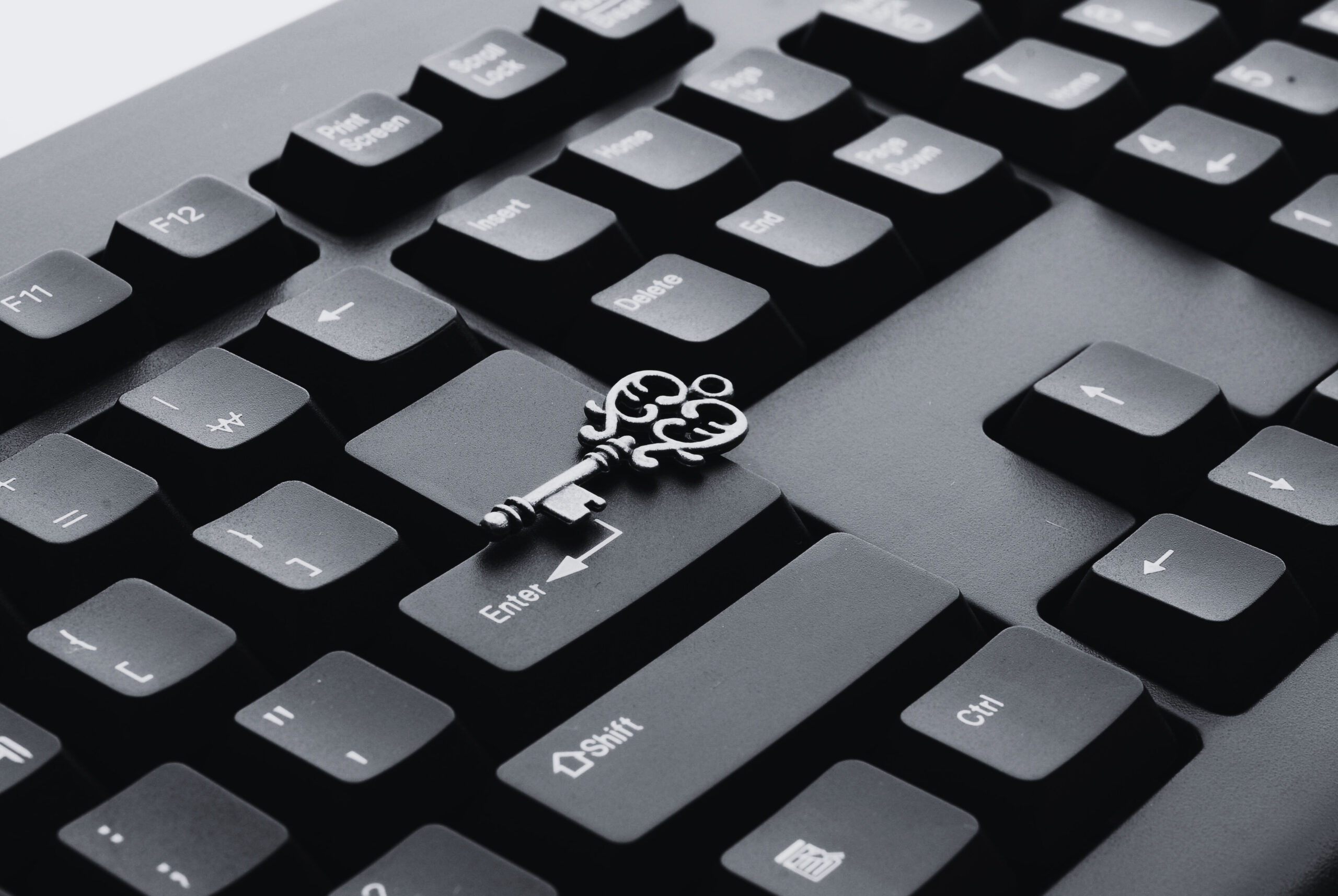 Keyboard with ring symbolising real estate brand