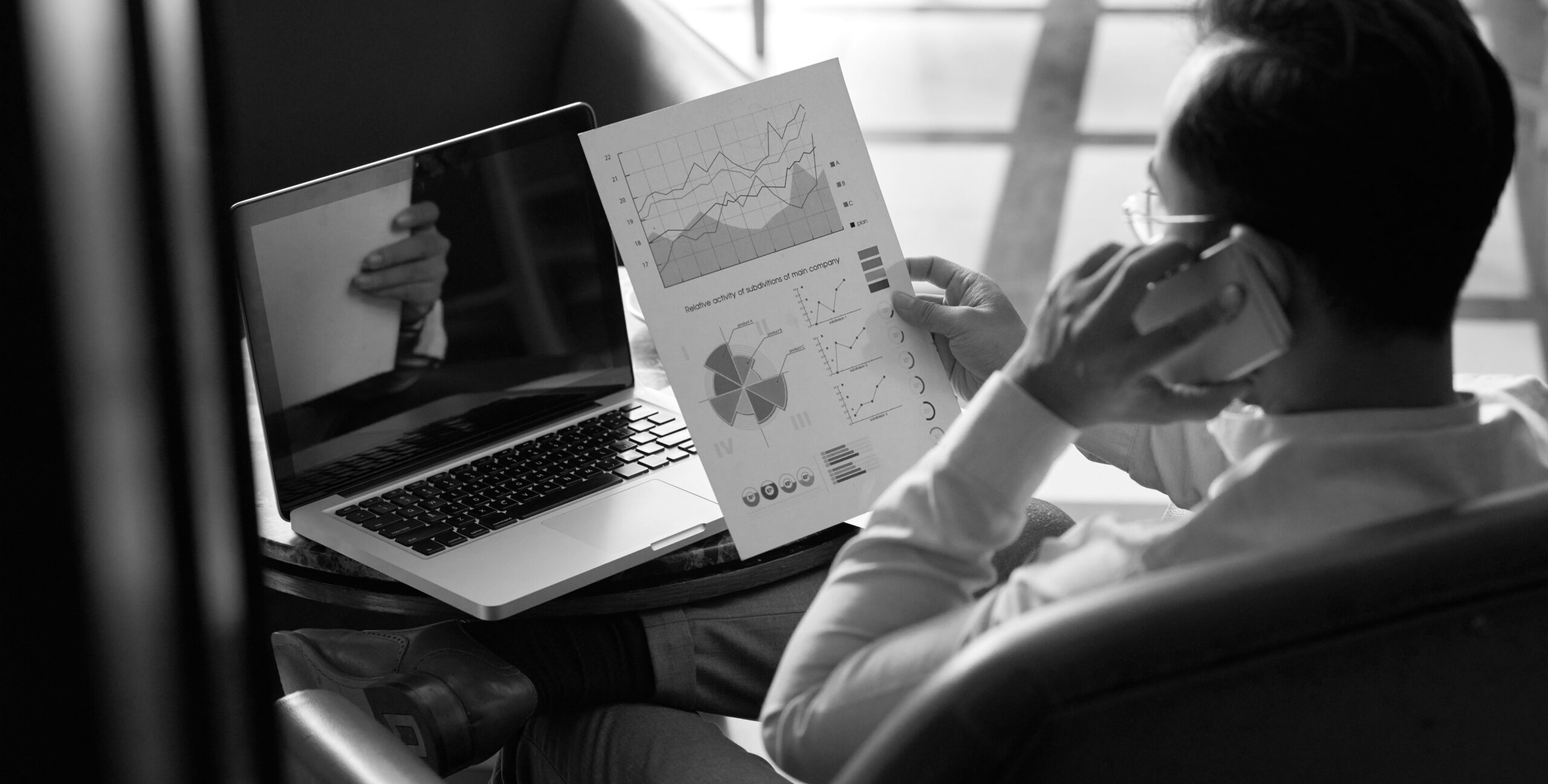 Digital real estate marketing analysis on laptop screen